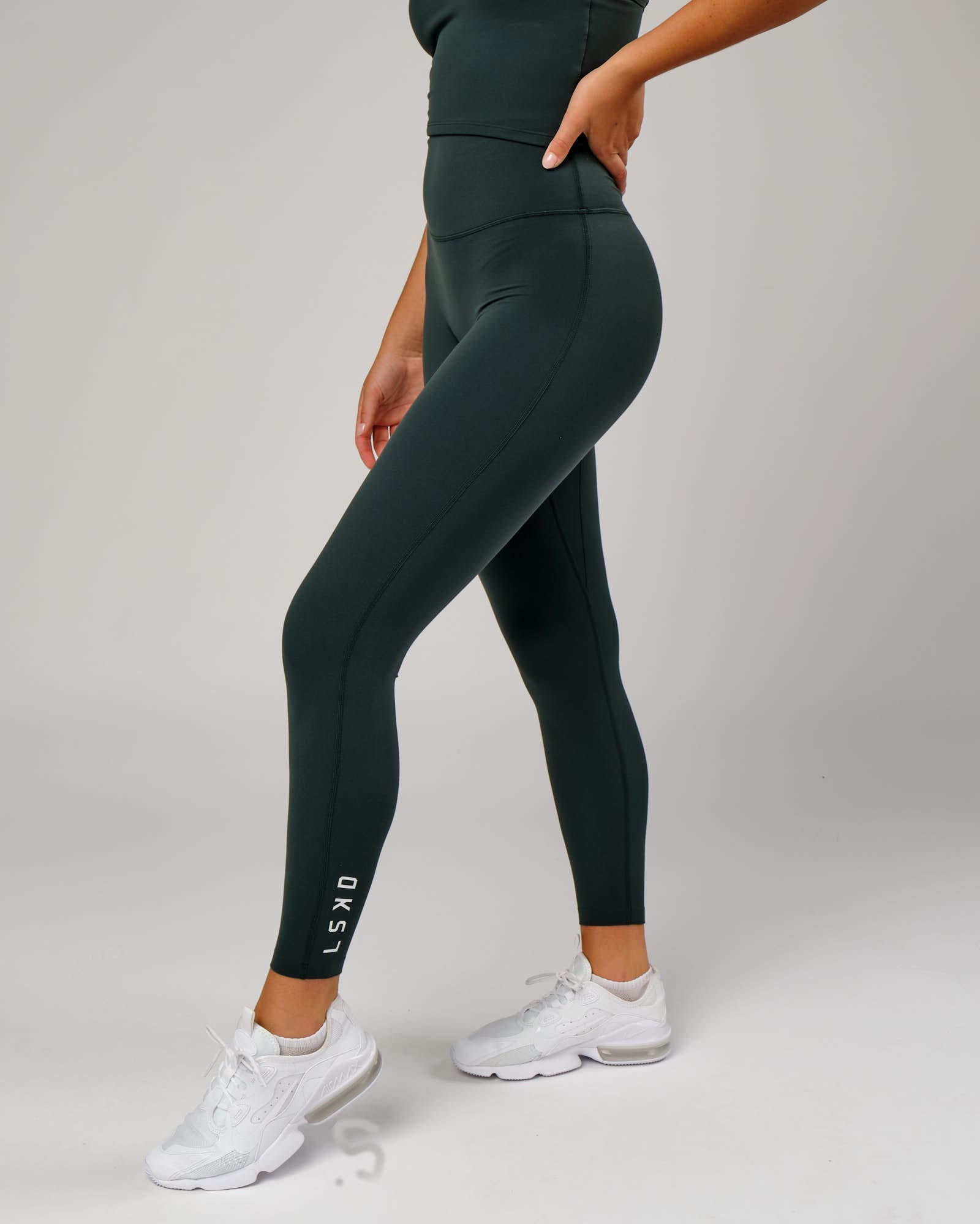 Model wearing Elixir Full Length Tight - Vital Green