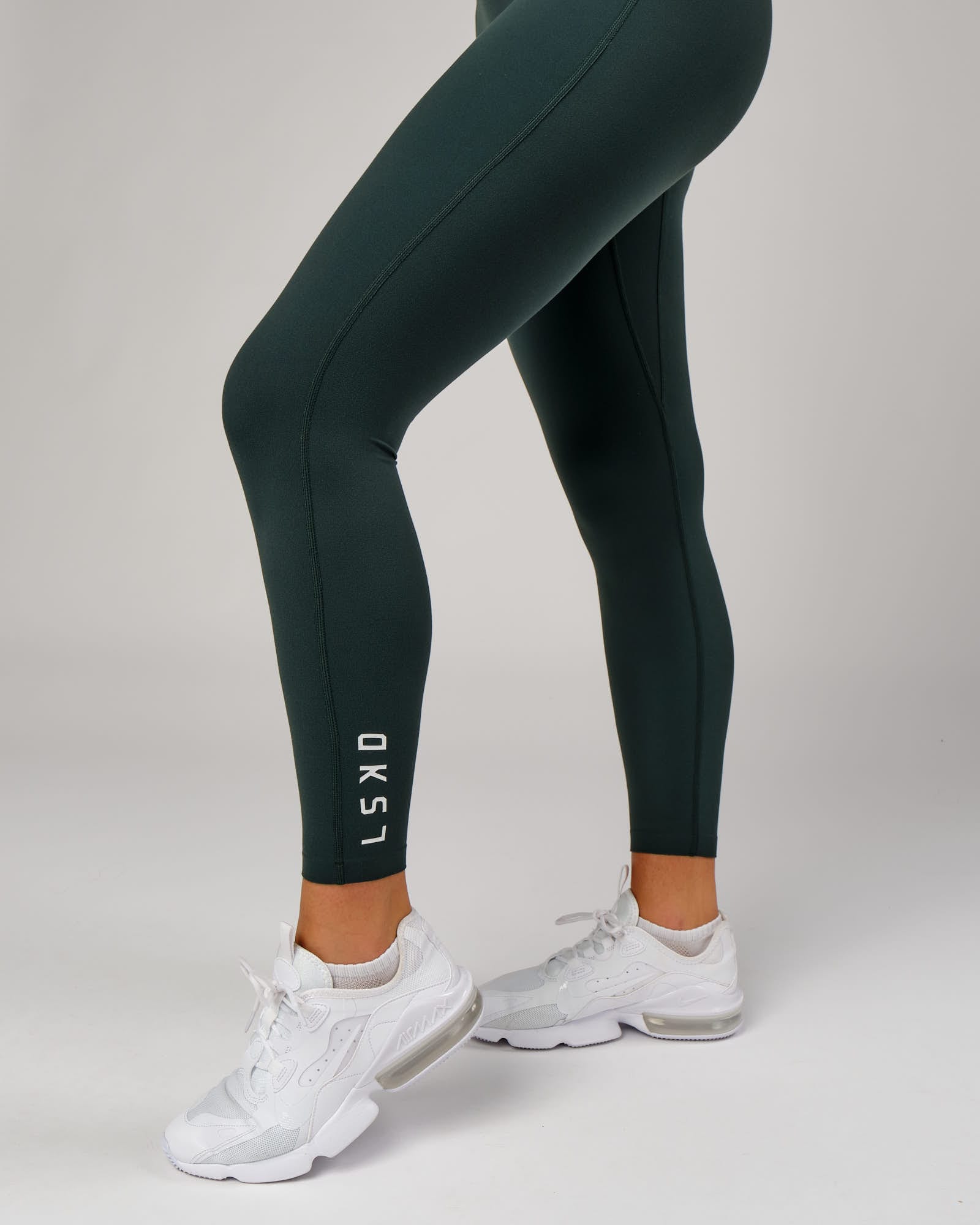 Model wearing Elixir Full Length Tight - Vital Green