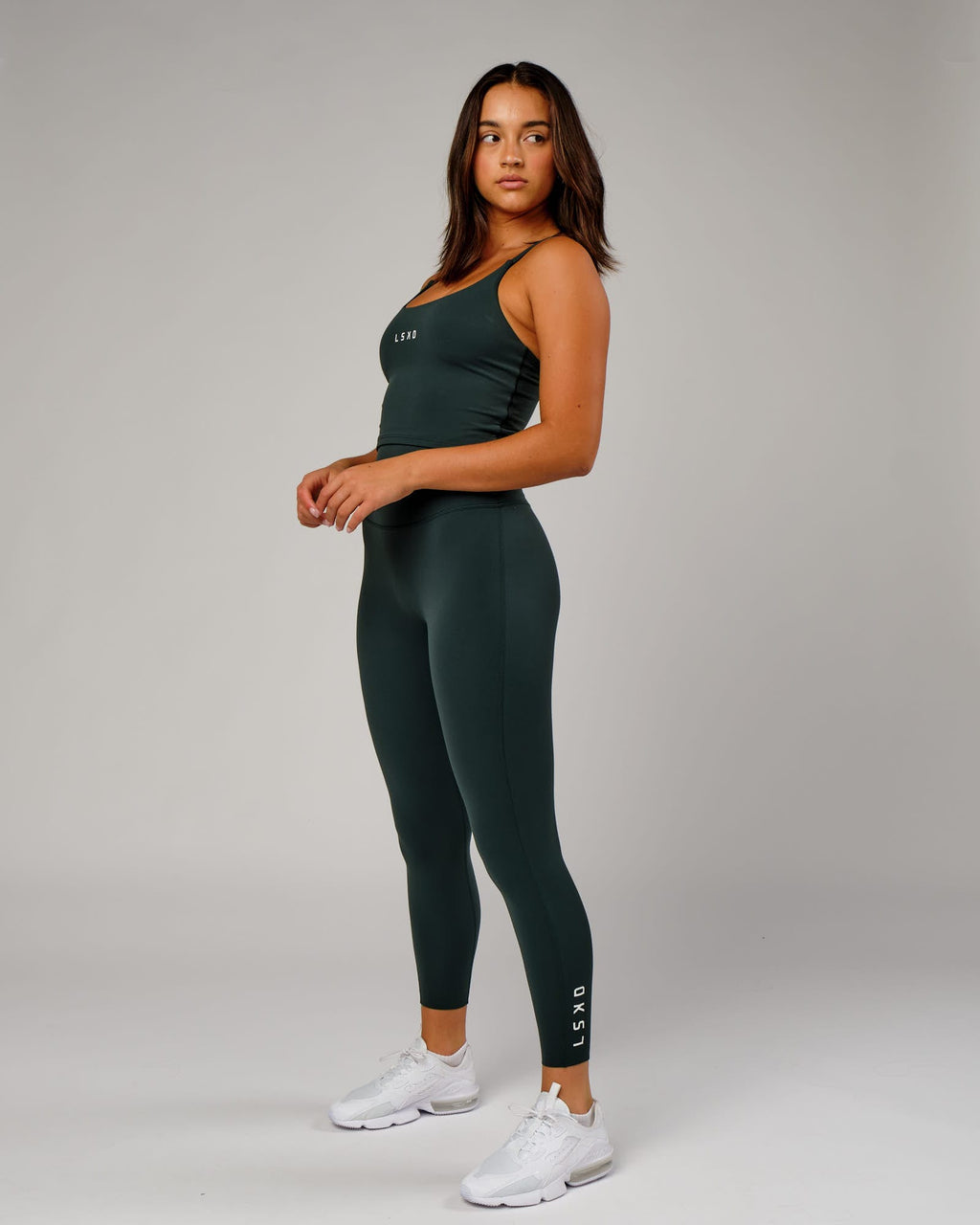 Model wearing Elixir 7/8 Length Tight - Vital Green