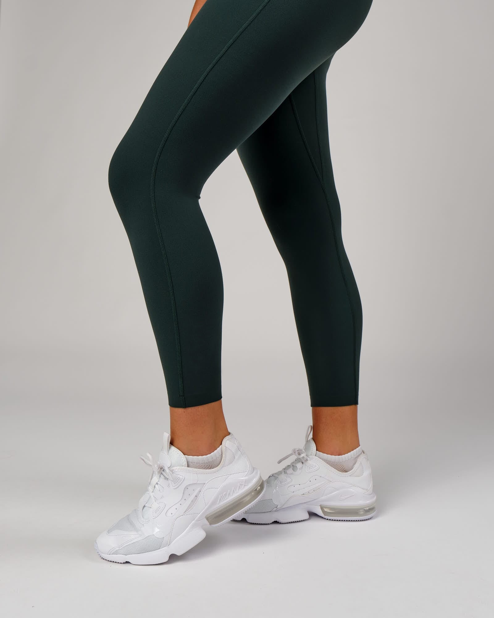 Model wearing Elixir 7/8 Length Tight - Vital Green