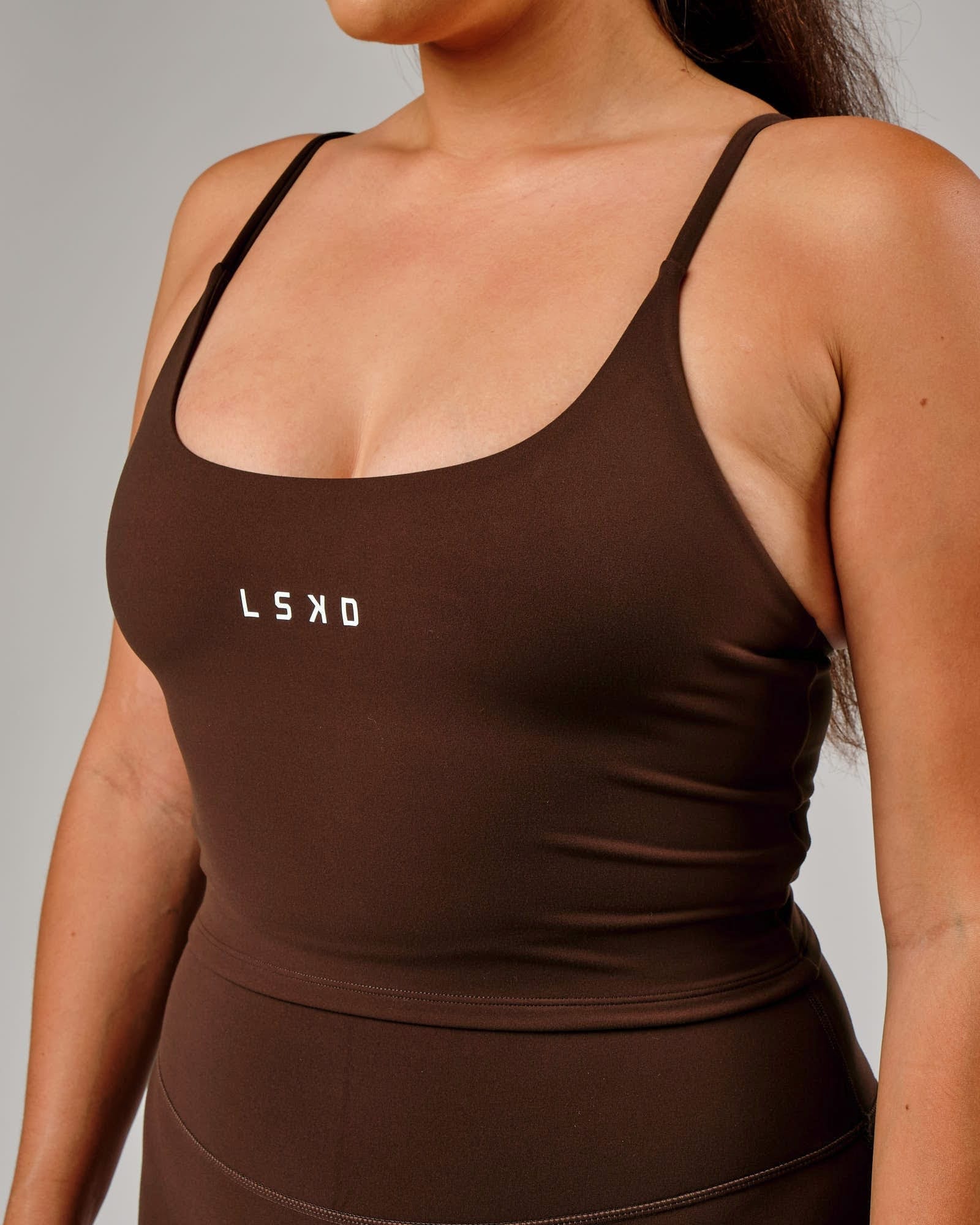 Model wearing Elixir Active Tank - Chocolate