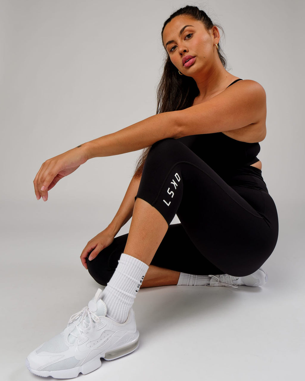 Model wearing Elixir 3/4 Length Tight - Black