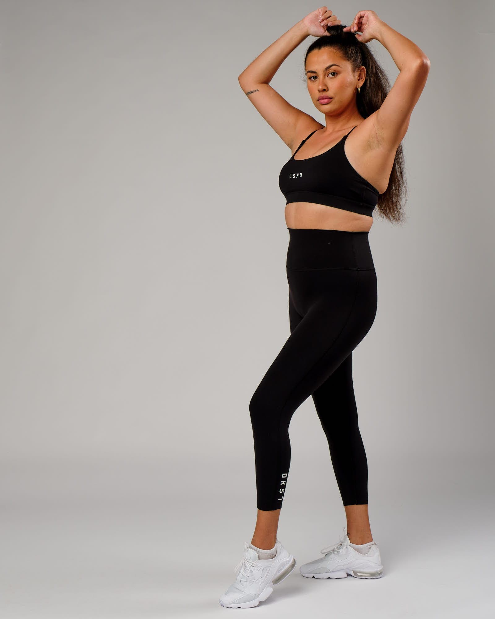 Model wearing Elixir 7/8 Length Tight - Black