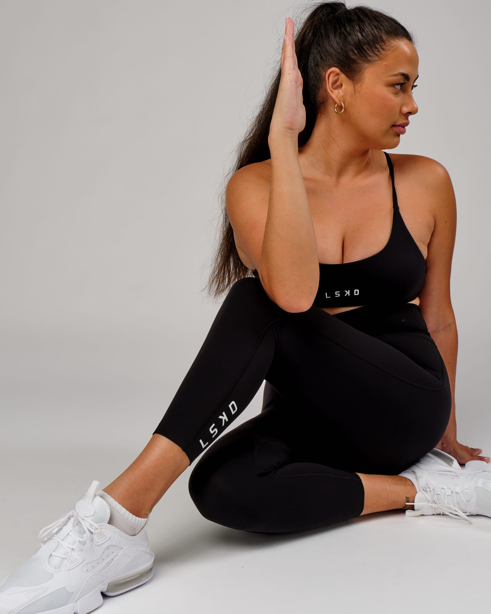 Model wearing Elixir 7/8 Length Tight - Black