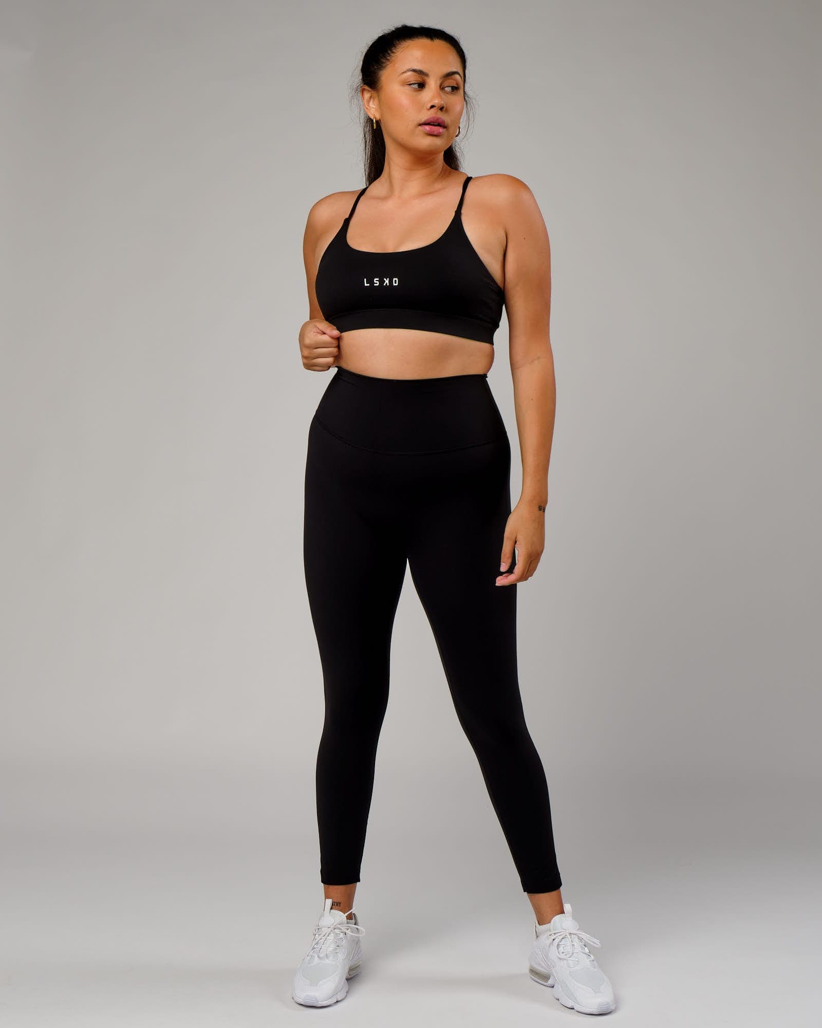 Model wearing Elixir Full Length Tight - Black