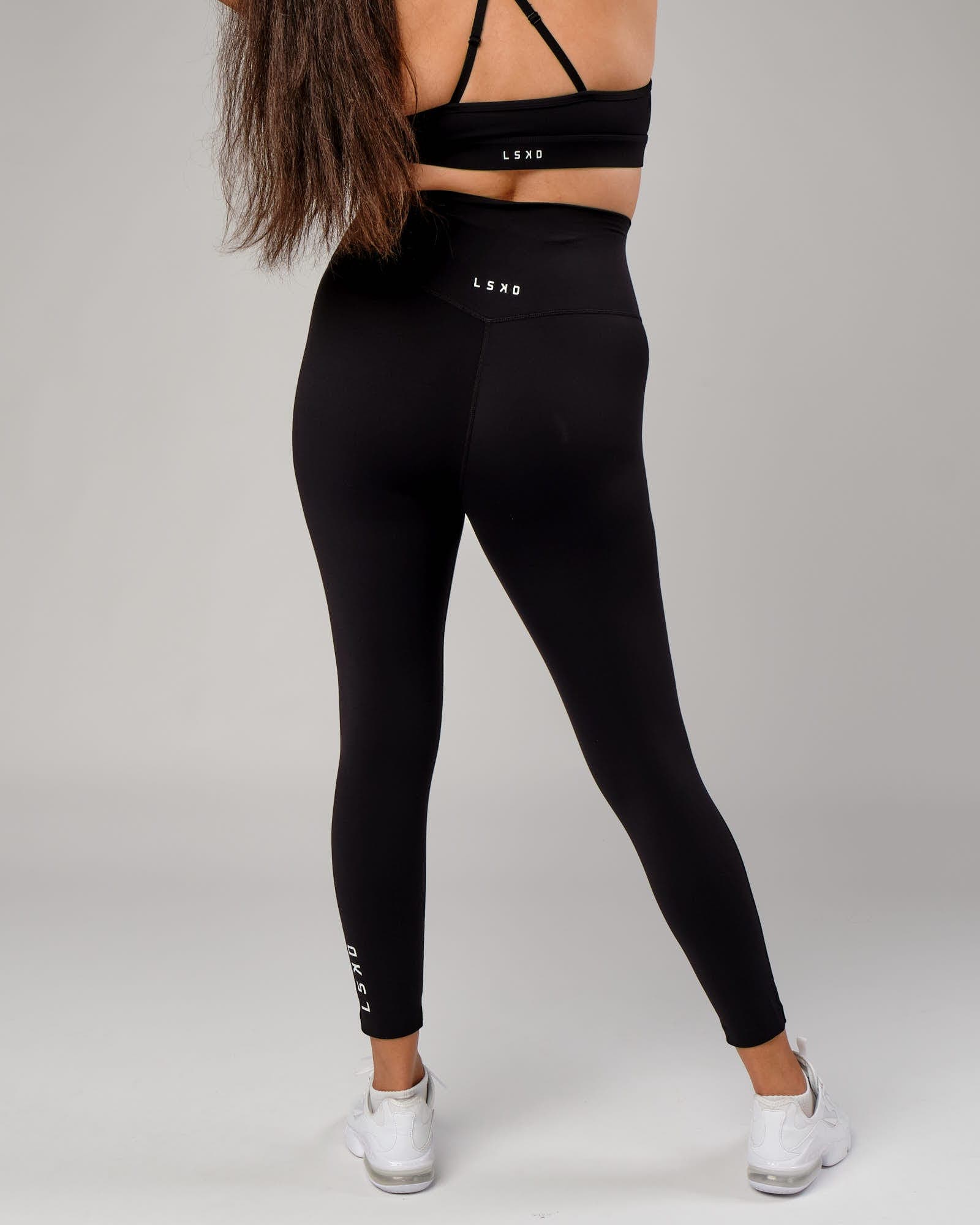 Model wearing Elixir Full Length Tight - Black