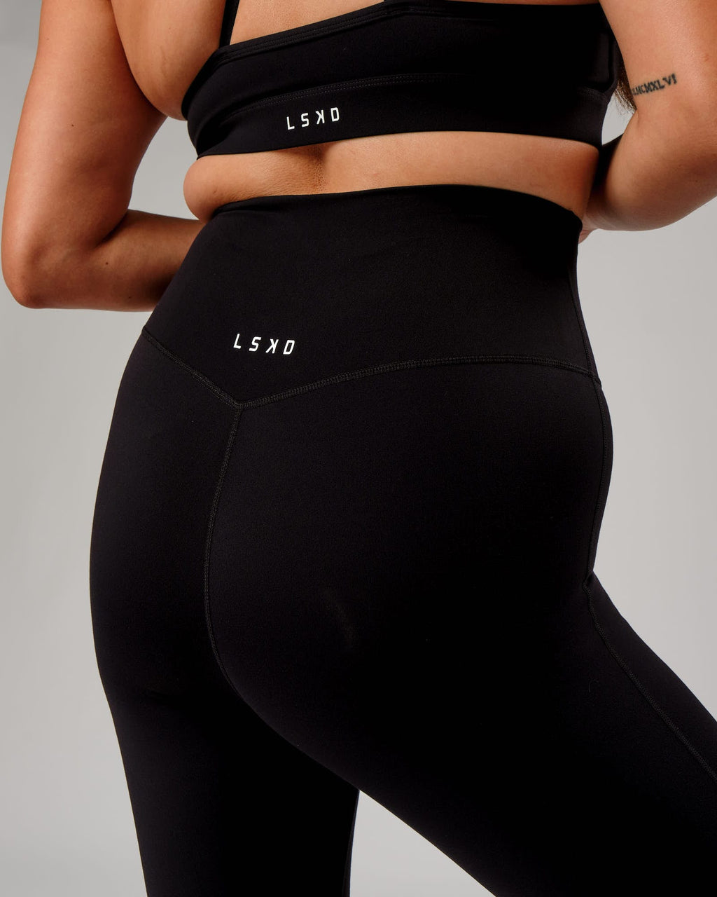 Model wearing Elixir Full Length Tight - Black