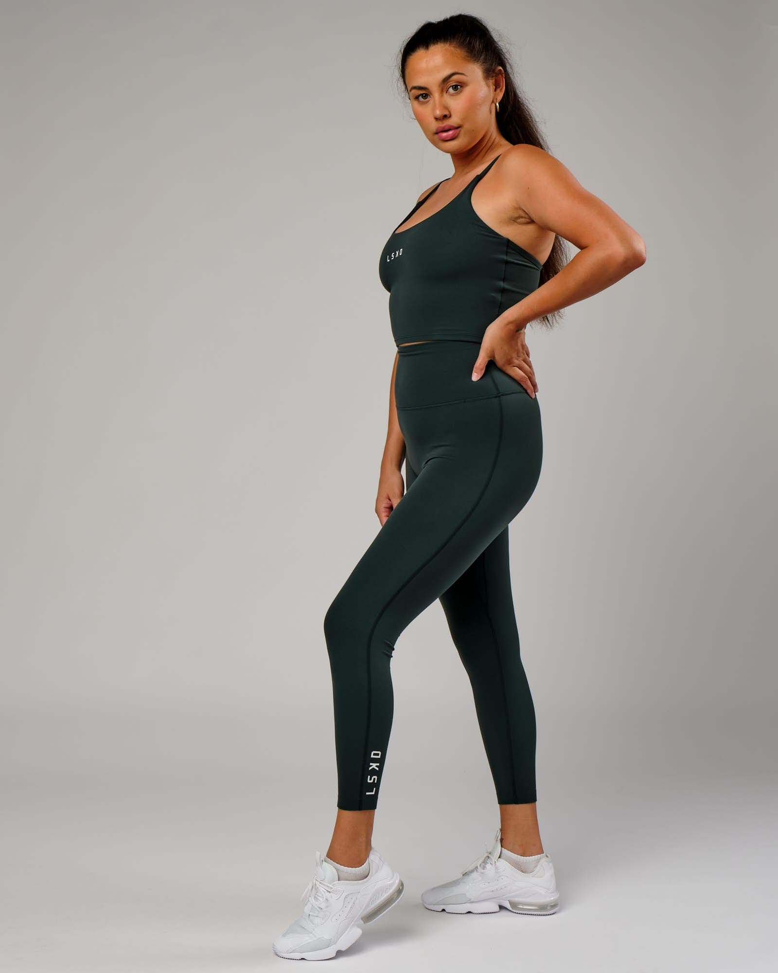Model wearing Elixir Full Length Tight - Vital Green
