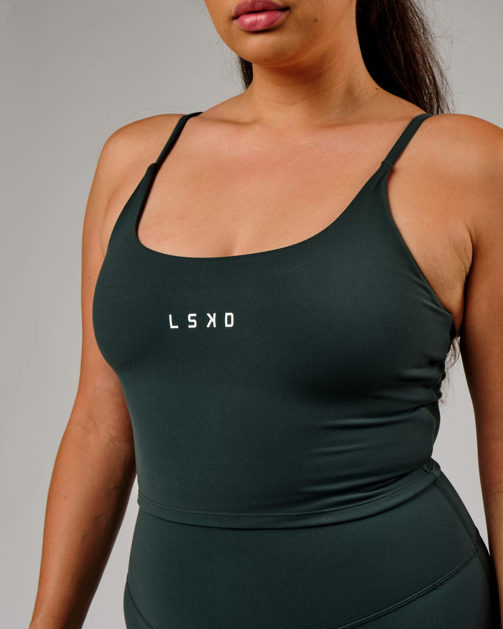 Model wearing Elixir Active Tank - Vital Green