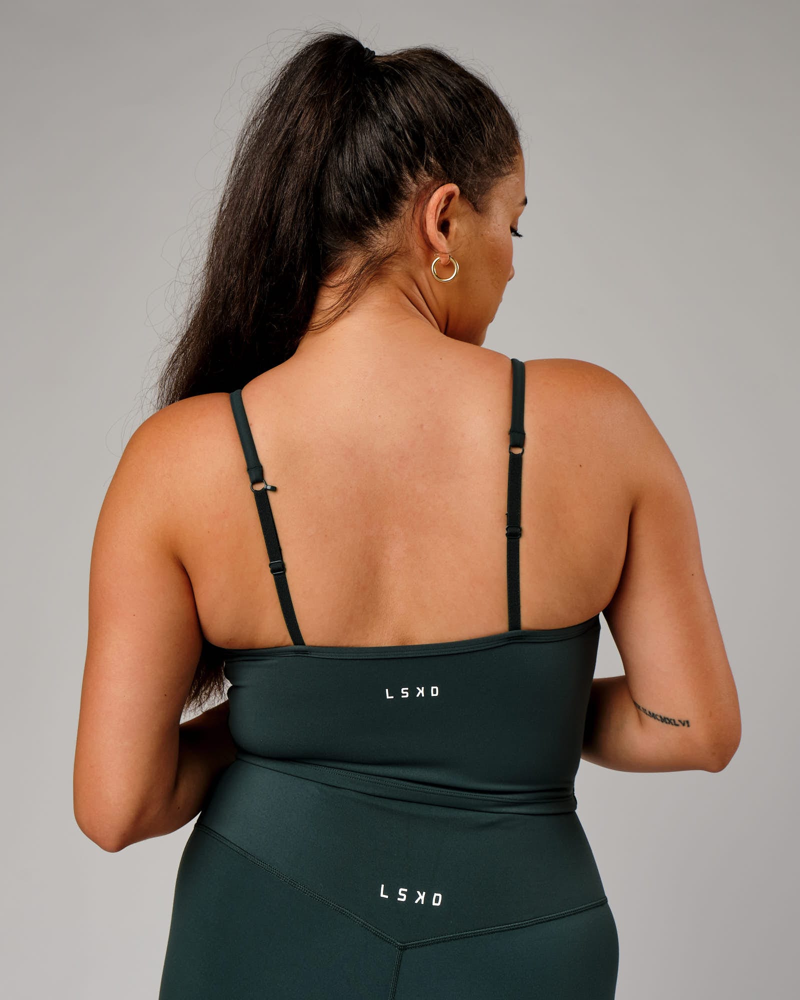 Model wearing Elixir Active Tank - Vital Green