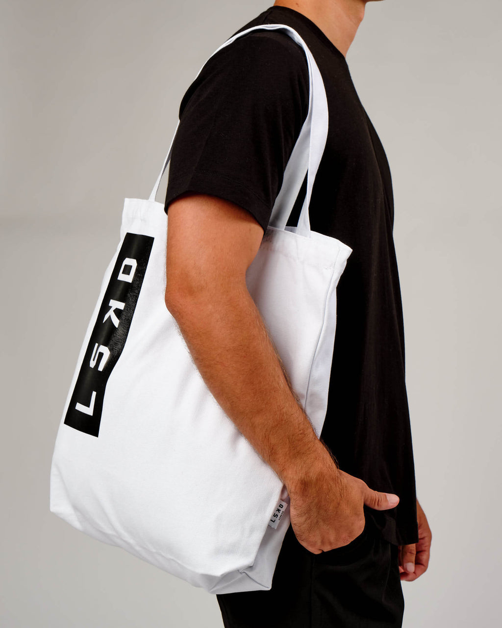 Model wearing Limits Tote Bag - White