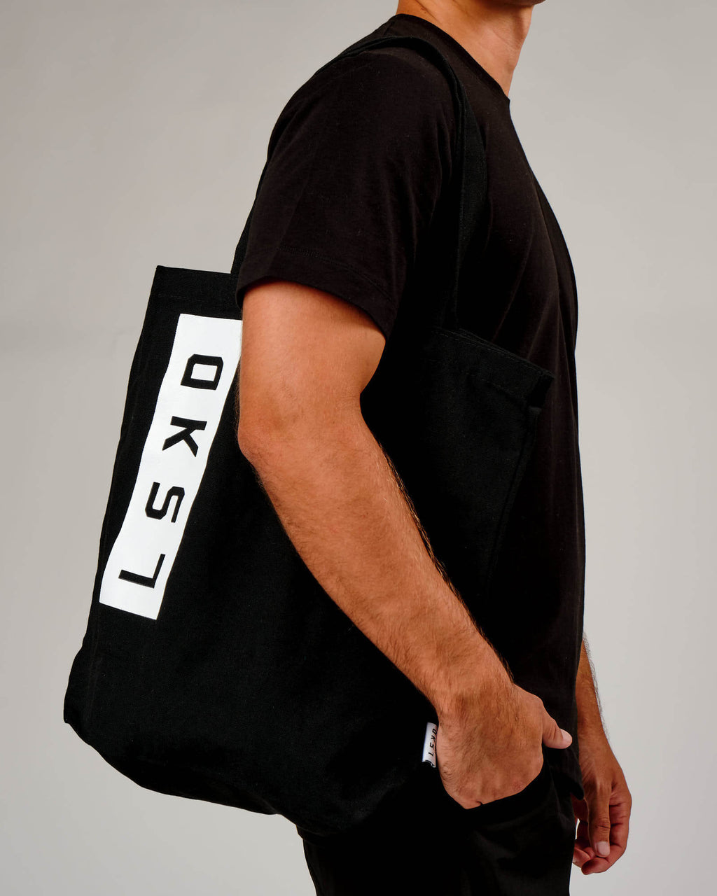 Model wearing Limits Tote Bag - Black