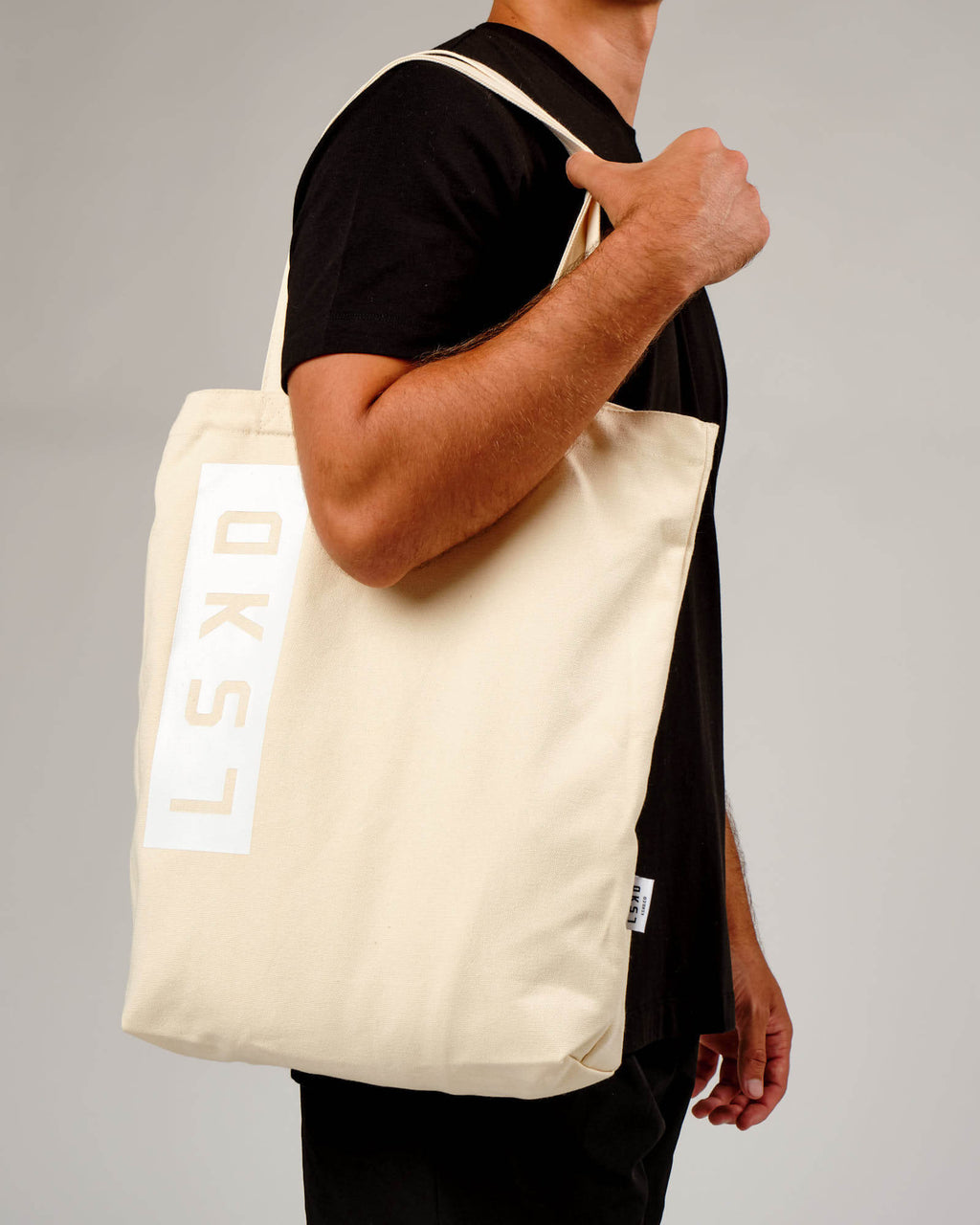 Model wearing Limits Tote Bag - Natural