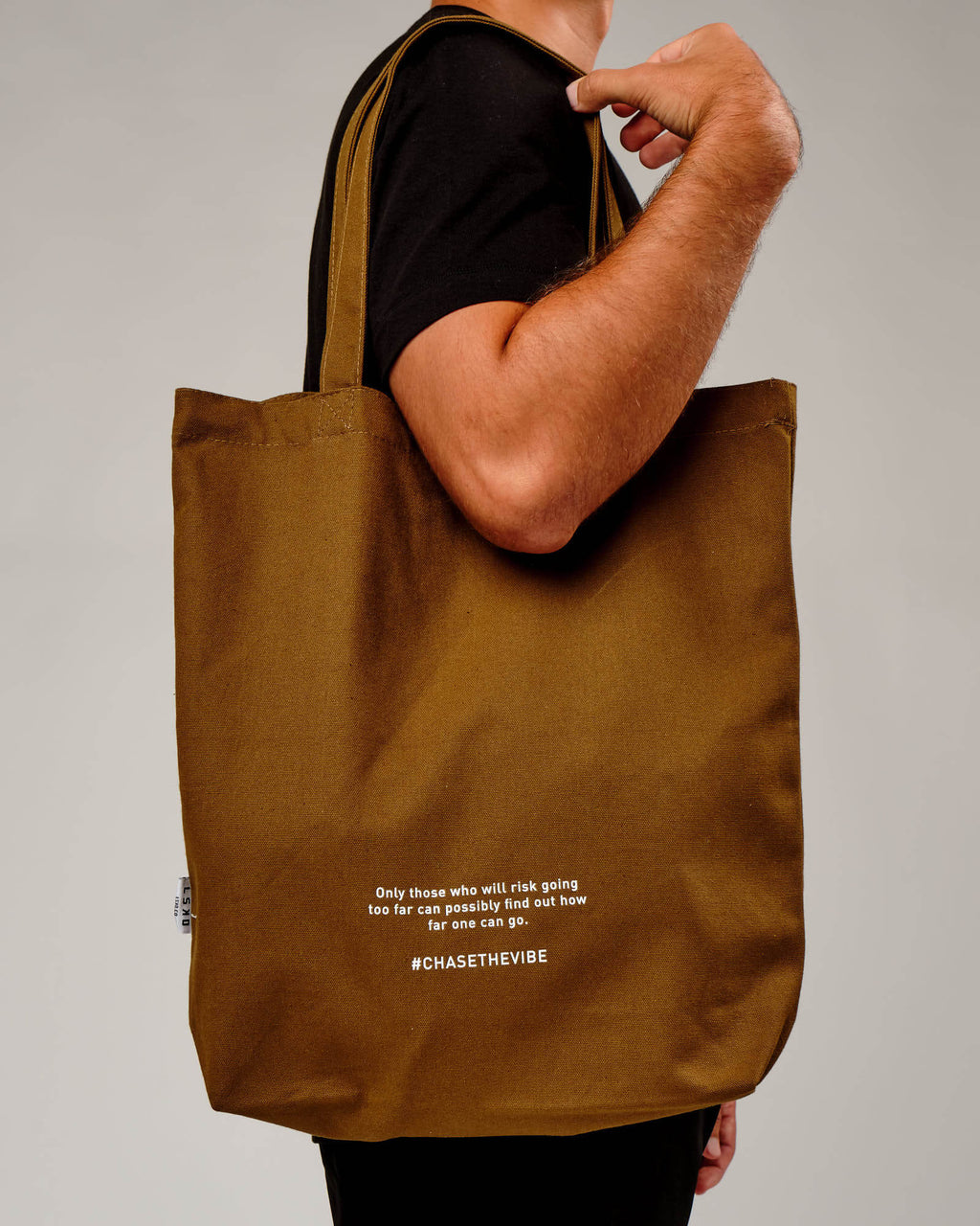 Model wearing Limits Tote Bag - Mocha