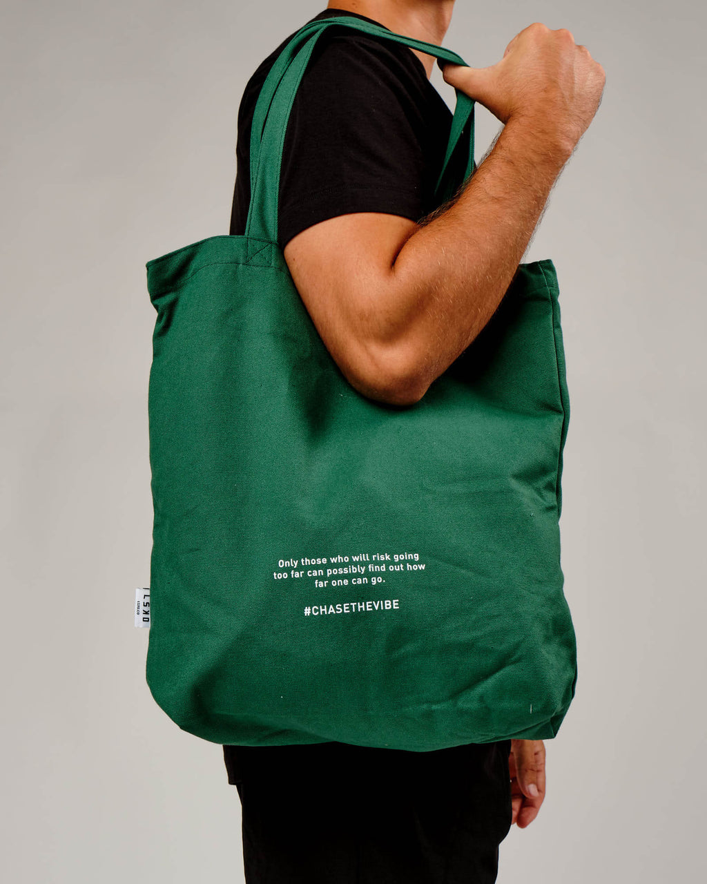 Model wearing Limits Tote Bag - Pine Green