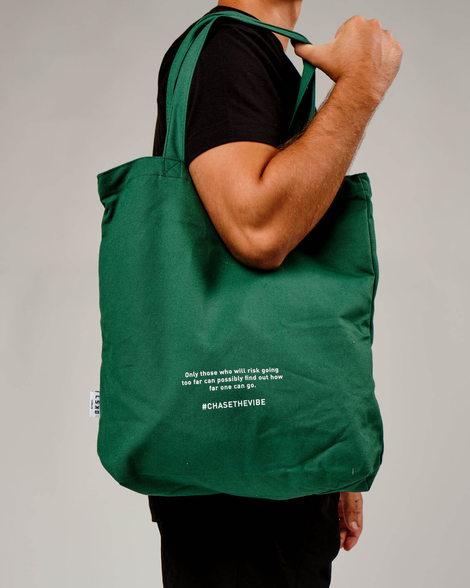 Model wearing Limits Tote Bag - Pine Green