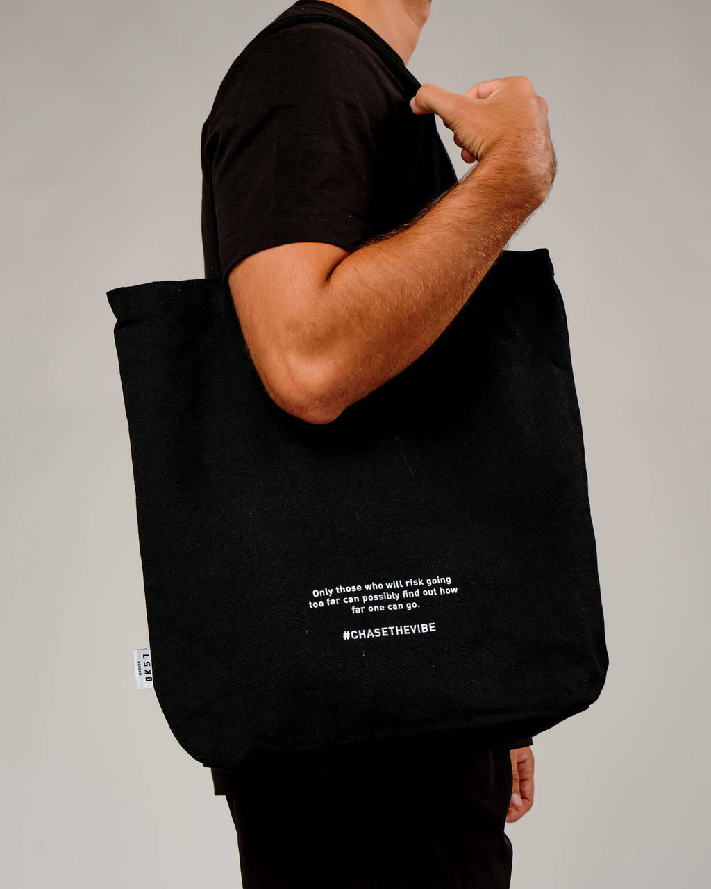 Model wearing Limits Tote Bag - Black
