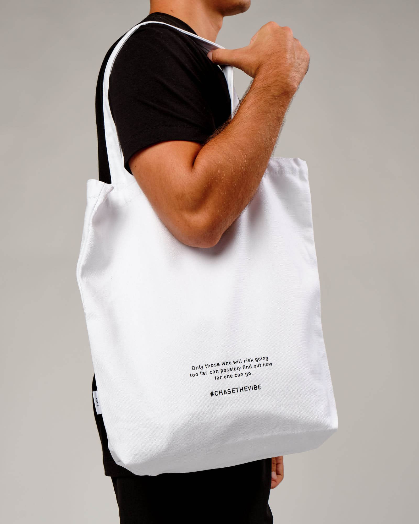 Model wearing Limits Tote Bag - White