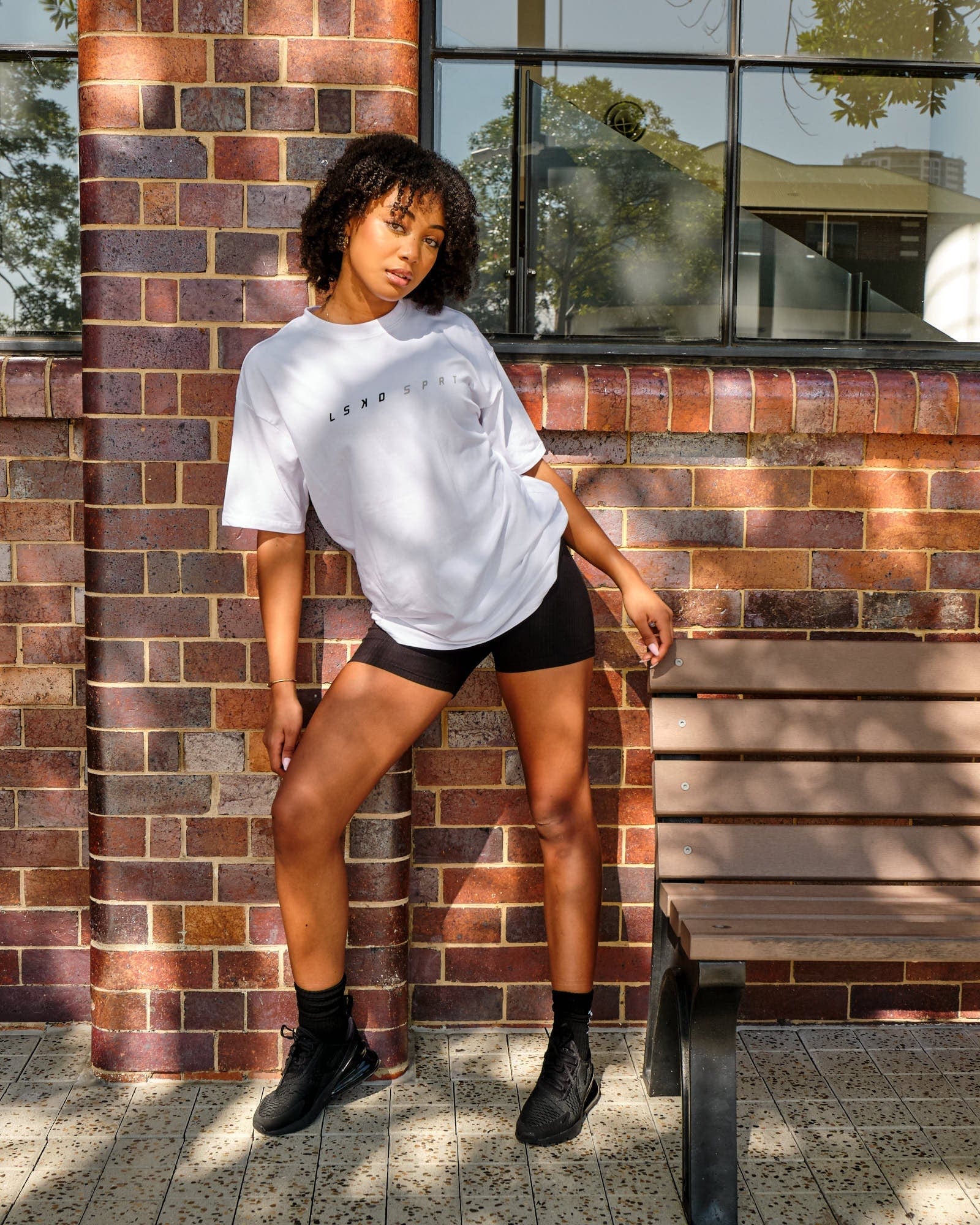 Model wearing Speedster Tee - White