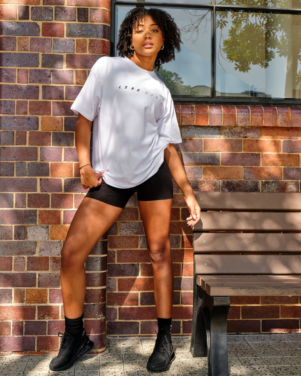 Model wearing Speedster Tee - White