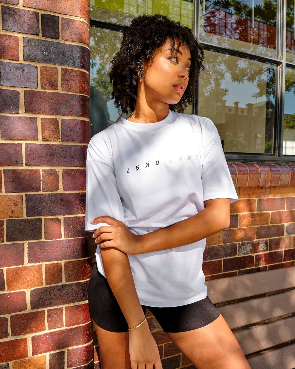 Model wearing Speedster Tee - White