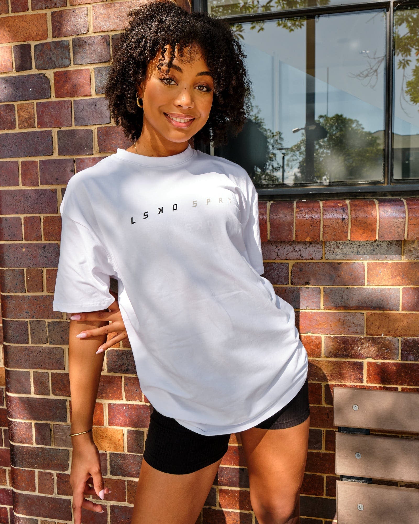 Model wearing Speedster Tee - White