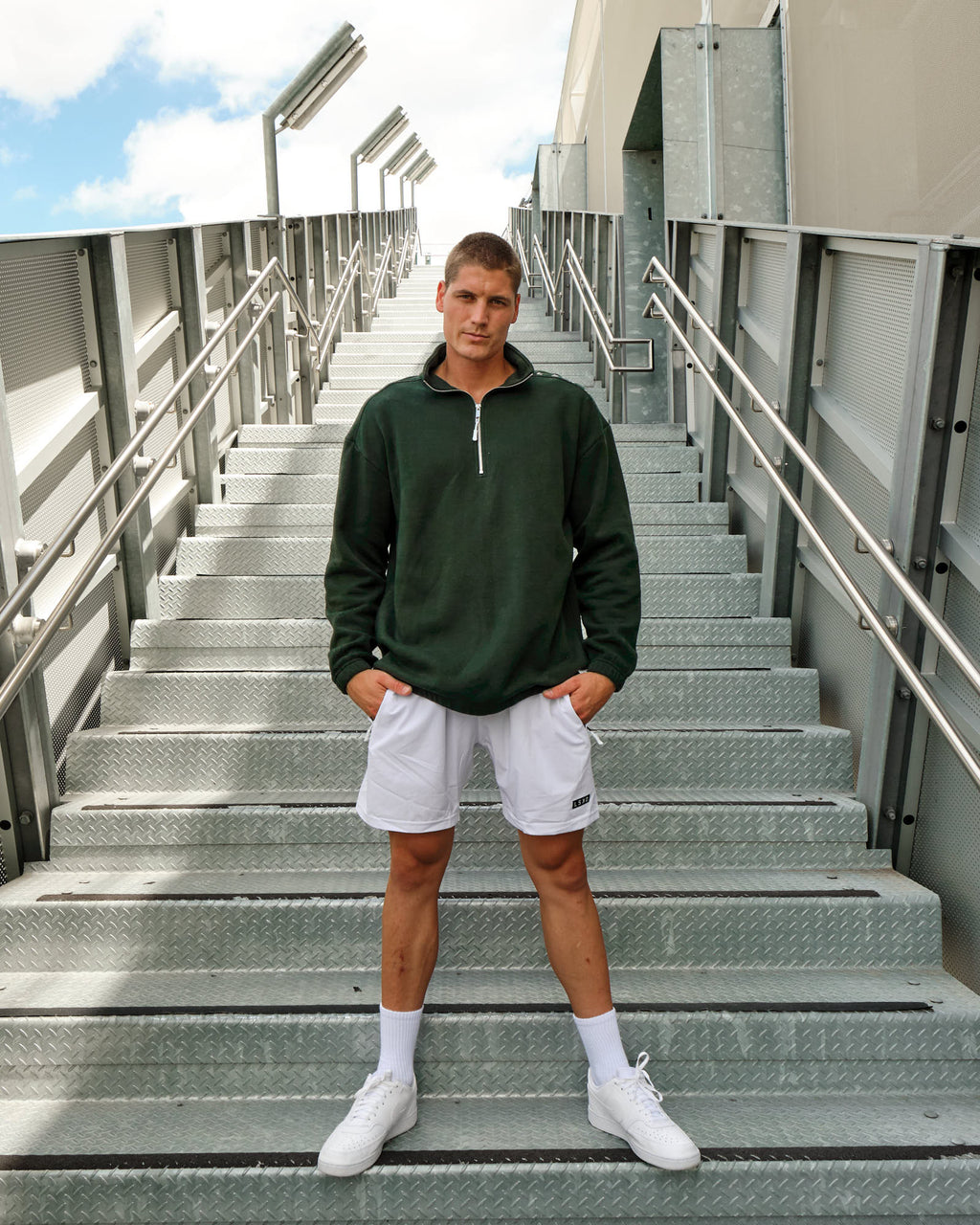 Model wearing Competitor 1/4 Zip Sweater - Forest