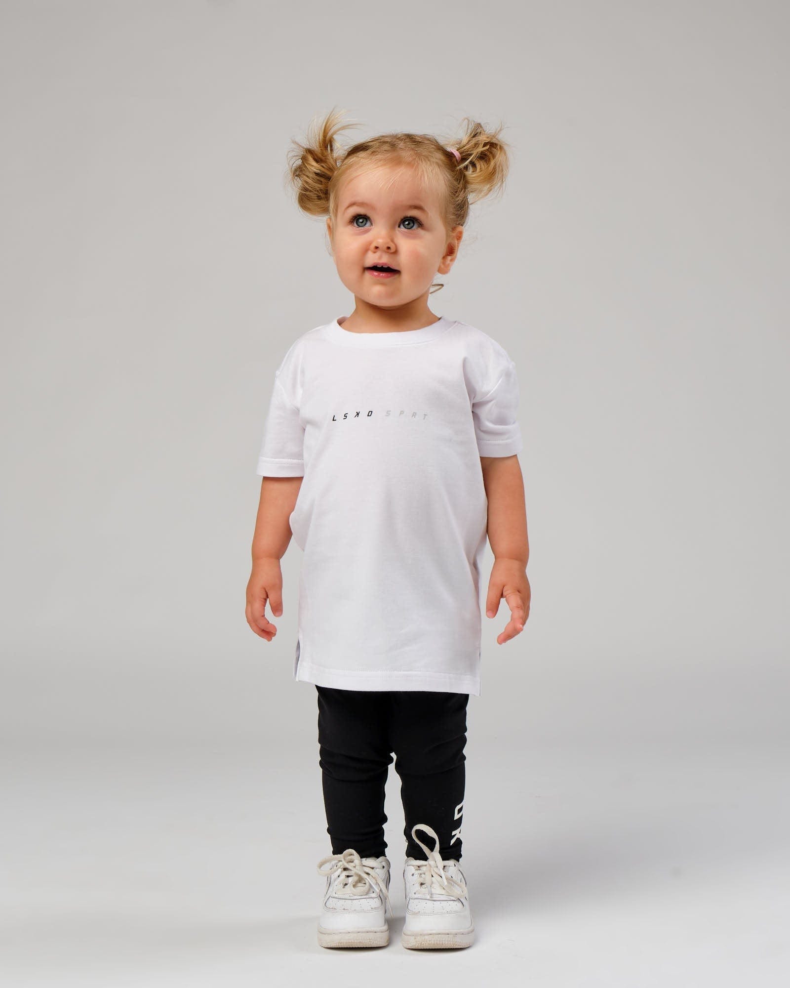 Model wearing Speedster Tee - White (00-8)