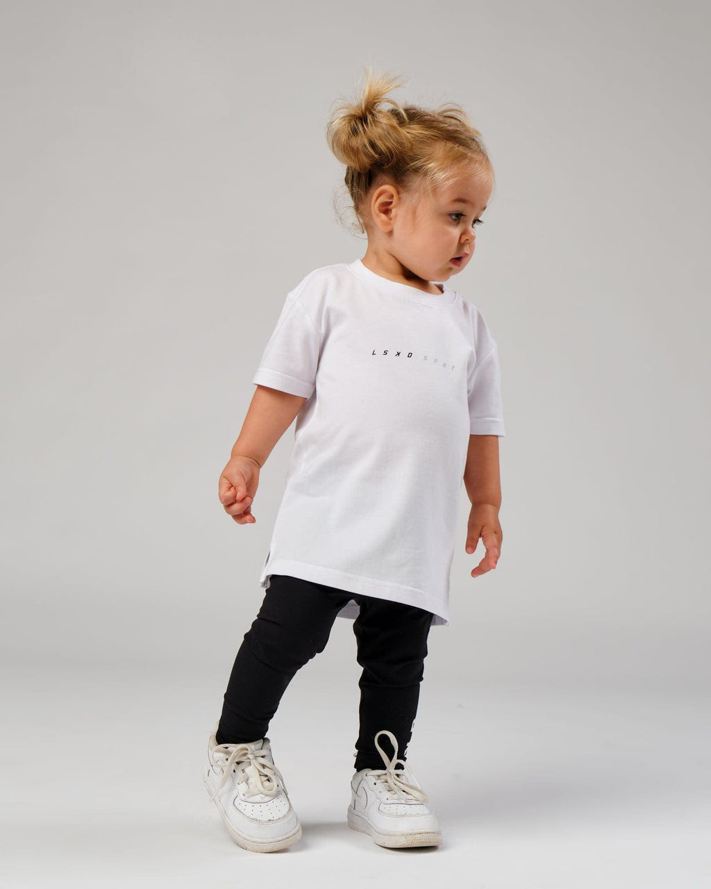 Model wearing Speedster Tee - White (00-8)