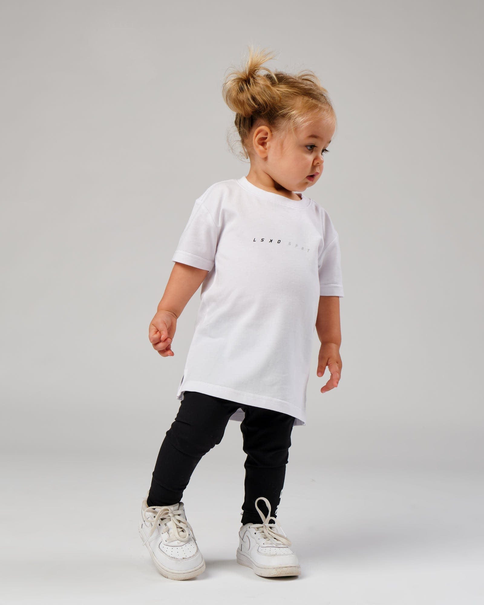 Model wearing Speedster Tee - White (00-8)