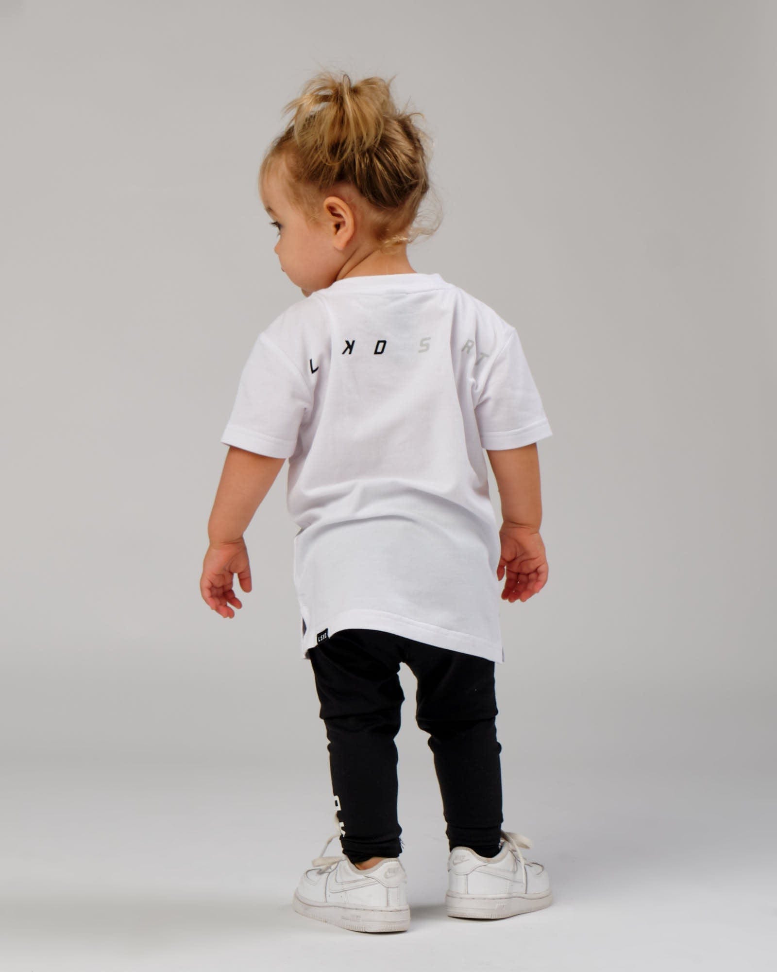 Model wearing Speedster Tee - White (00-8)