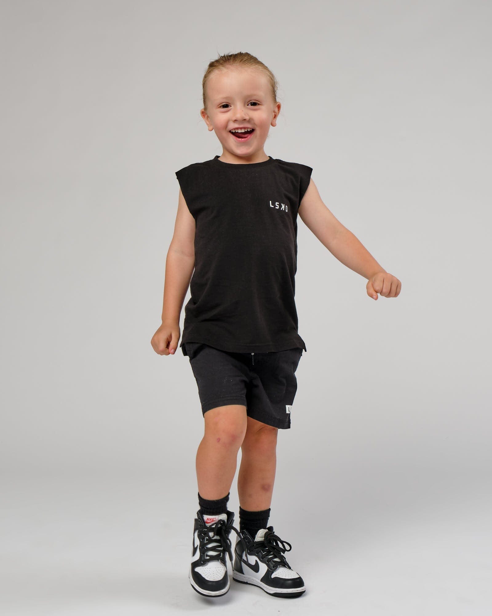 Model wearing Tilt Tank (00-8) - Pirate Black