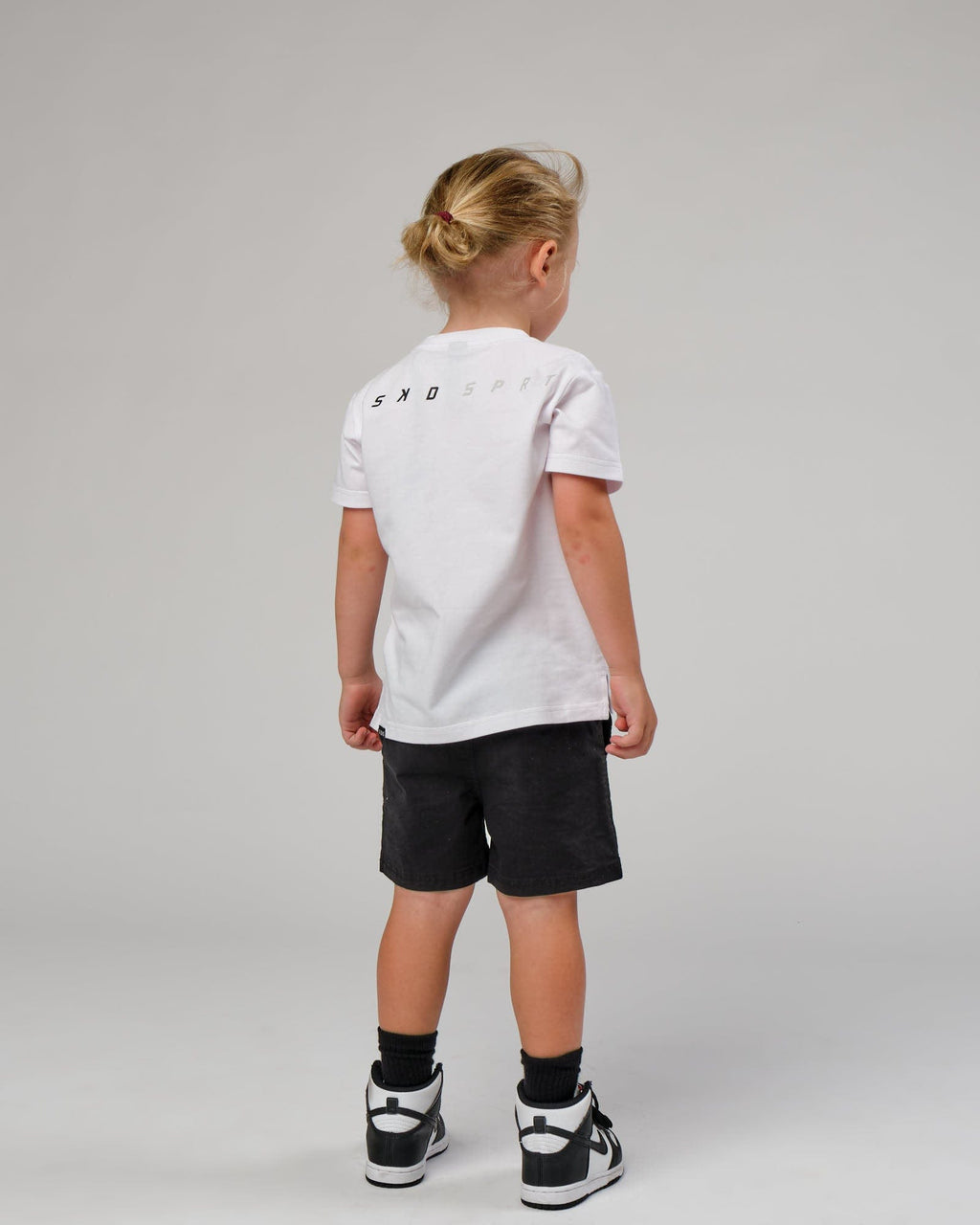 Model wearing Speedster Tee - White (00-8)