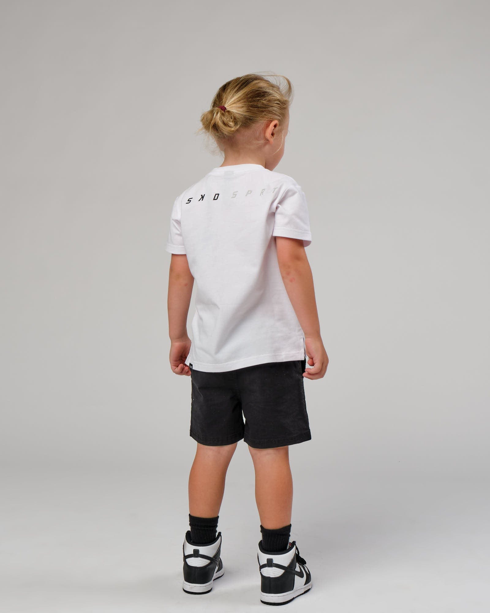 Model wearing Speedster Tee - White (00-8)