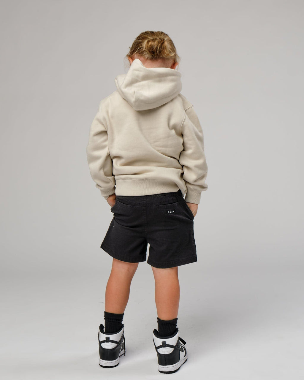 Model wearing Capsule Hoodie (00-8) - Bone