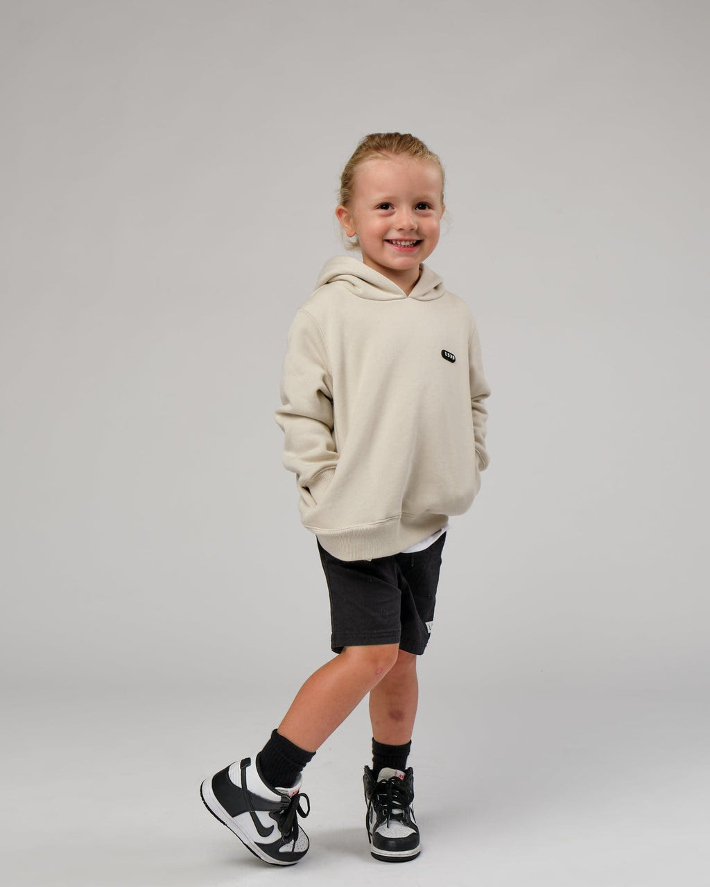 Model wearing Capsule Hoodie (00-8) - Bone