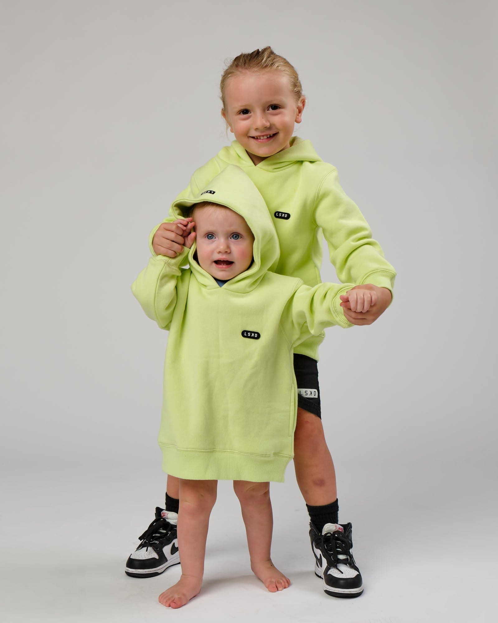 Model wearing Capsule Hoodie (00-8) - Pastel Lime