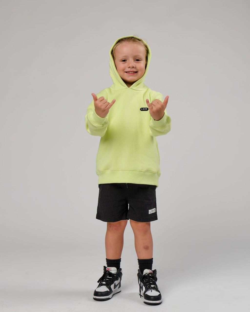 Model wearing Capsule Hoodie (00-8) - Pastel Lime