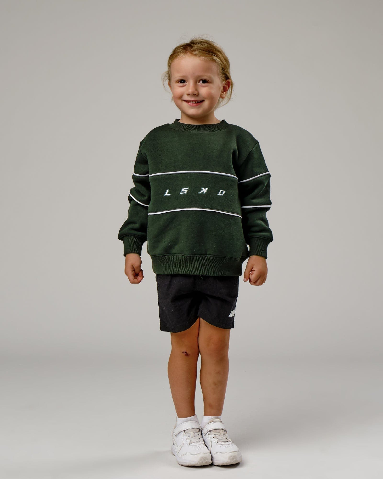 Model wearing Ascent Sweater (00-8) - Forest-White