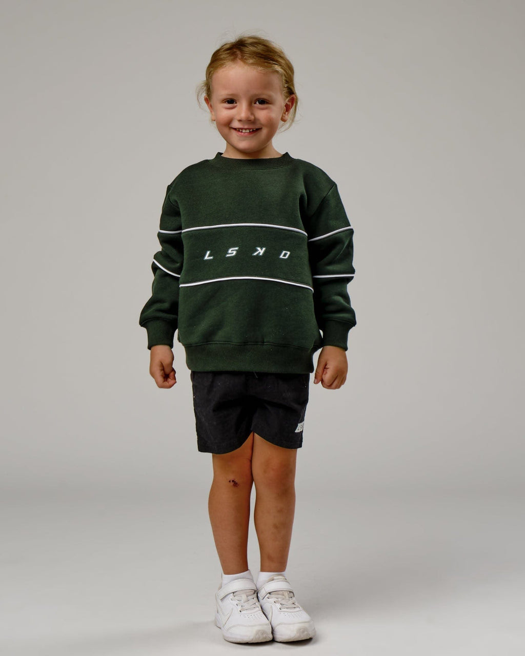 Model wearing Ascent Sweater (00-8) - Forest-White