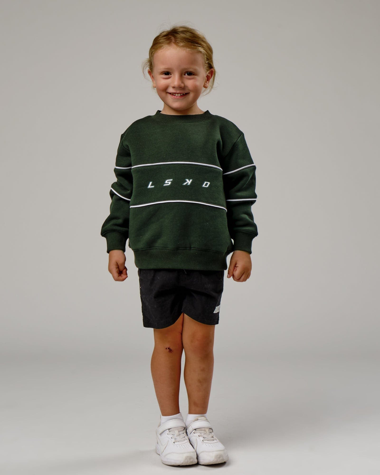 Model wearing Ascent Sweater (00-8) - Forest-White