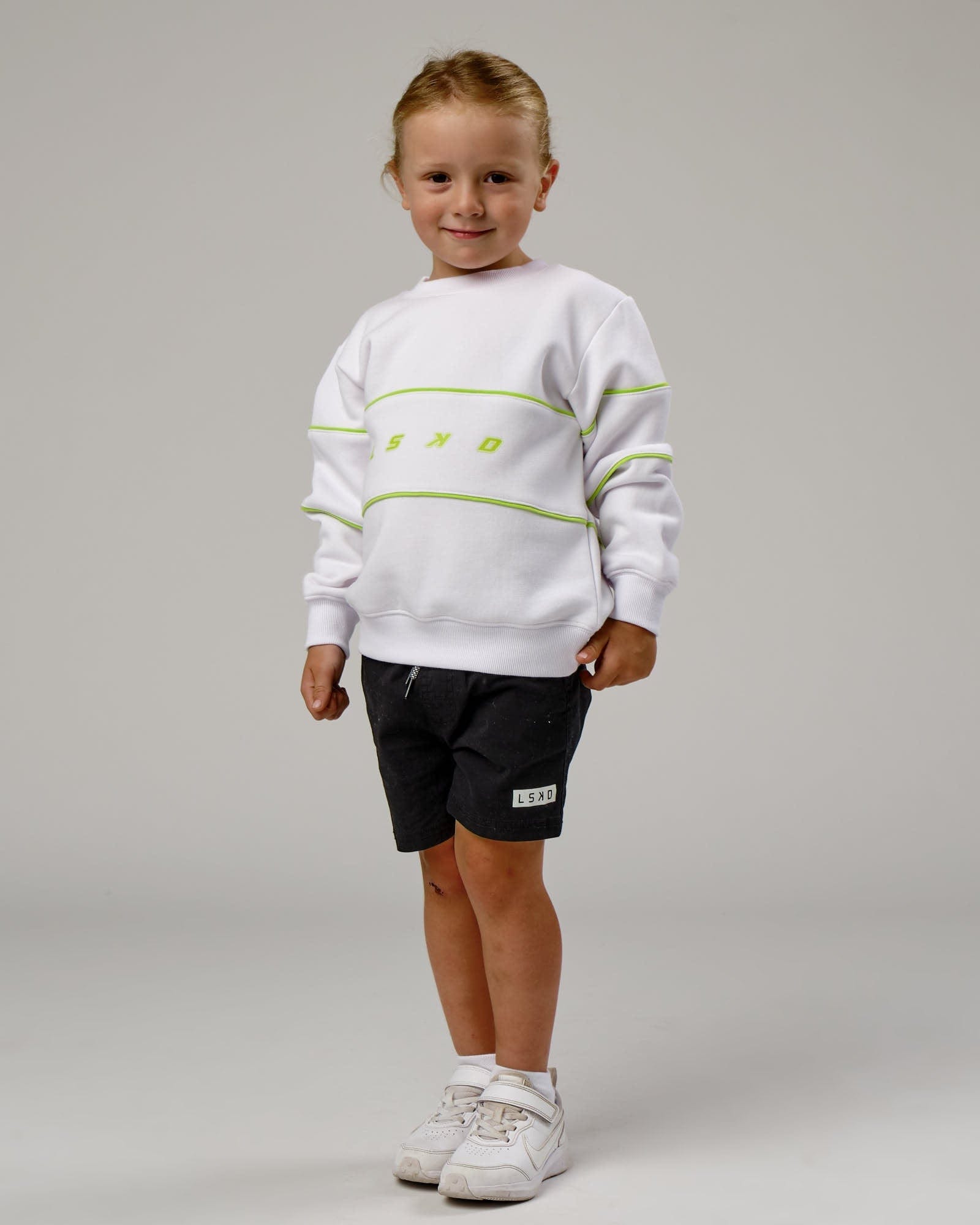 Model wearing Ascent Sweater (00-8) - White-Fluro Lime