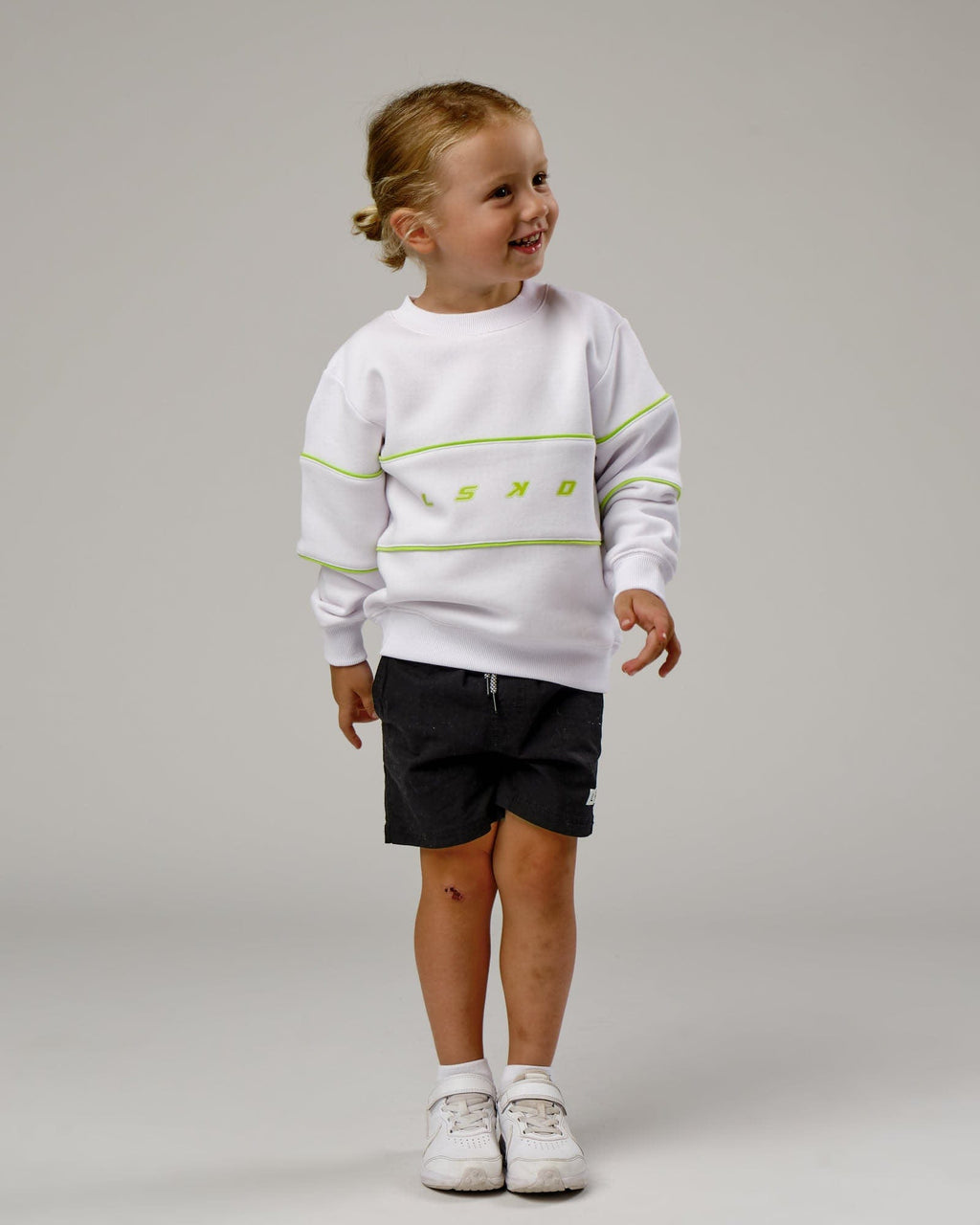 Model wearing Ascent Sweater (00-8) - White-Fluro Lime