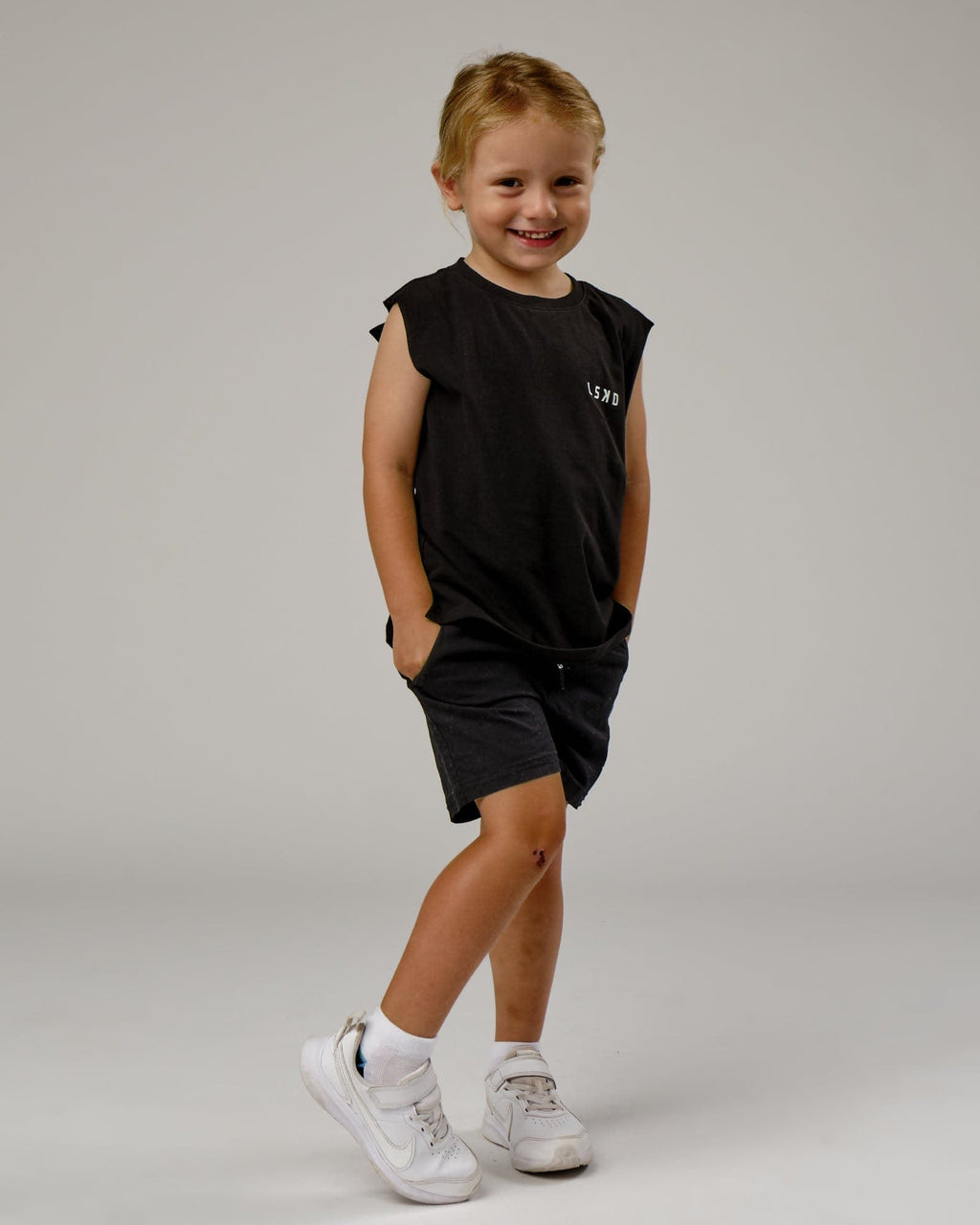 Model wearing Tilt Tank (00-8) - Pirate Black