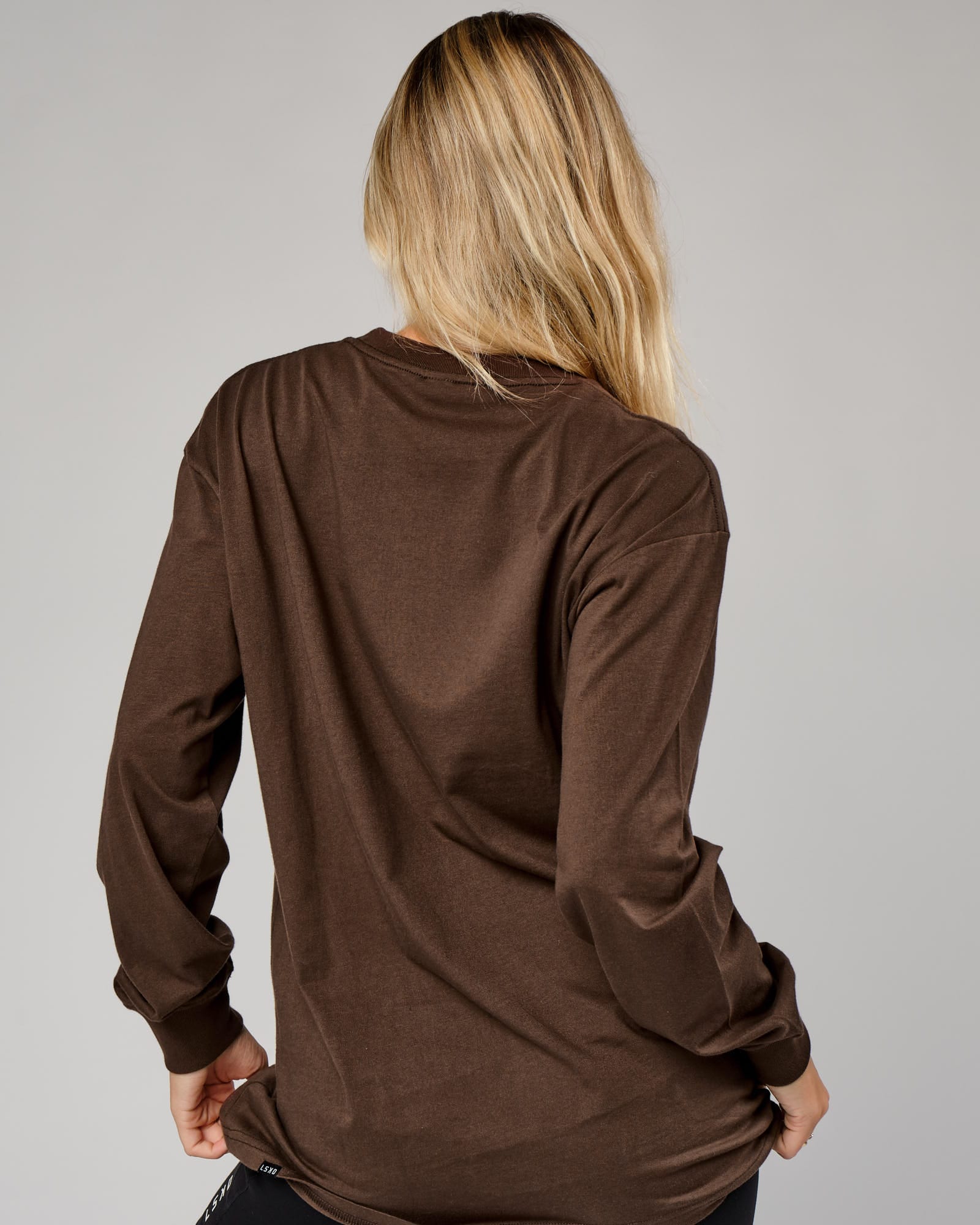 Model wearing Unisex Ascent LS Tee Oversize - Walnut
