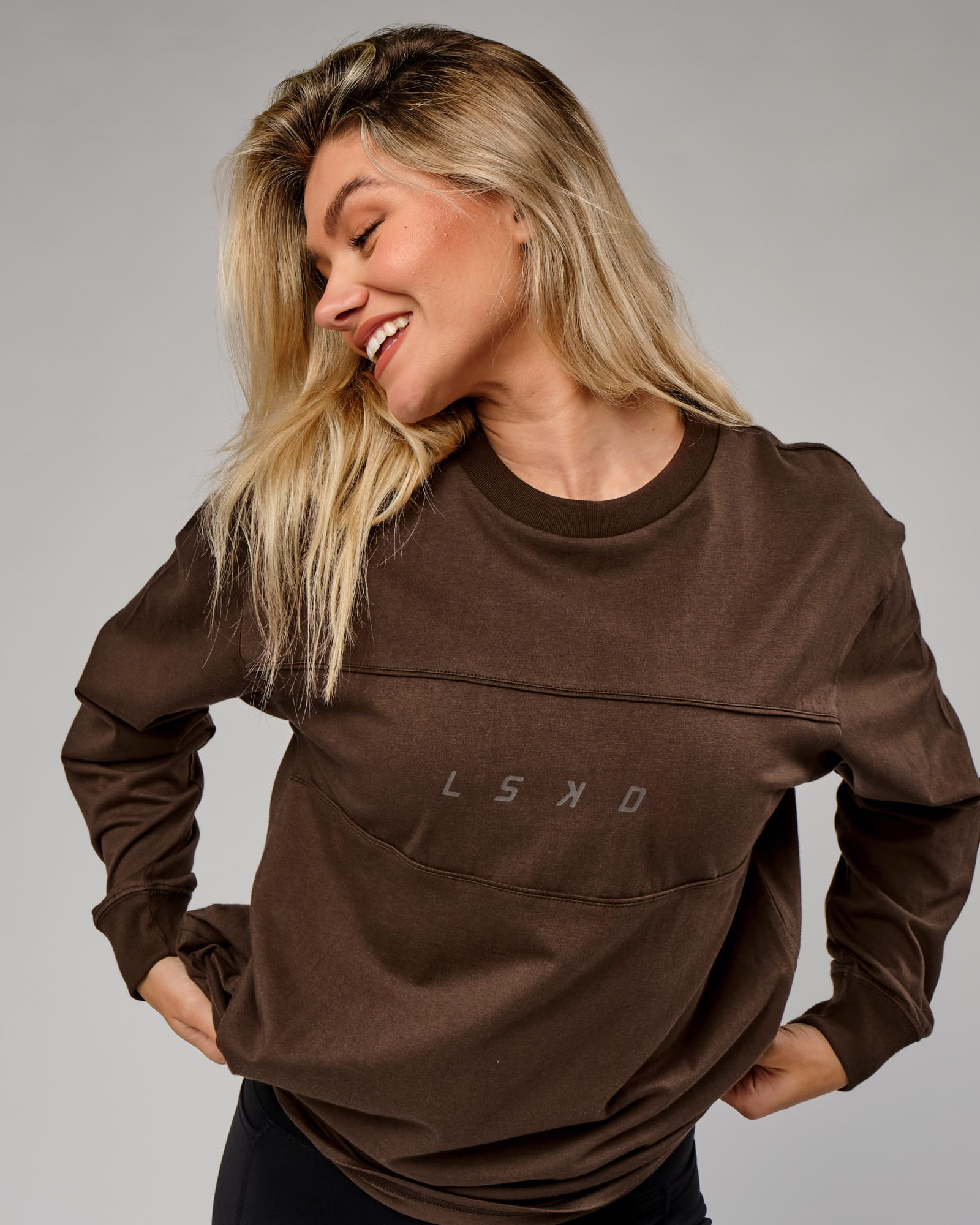 Model wearing Unisex Ascent LS Tee Oversize - Walnut