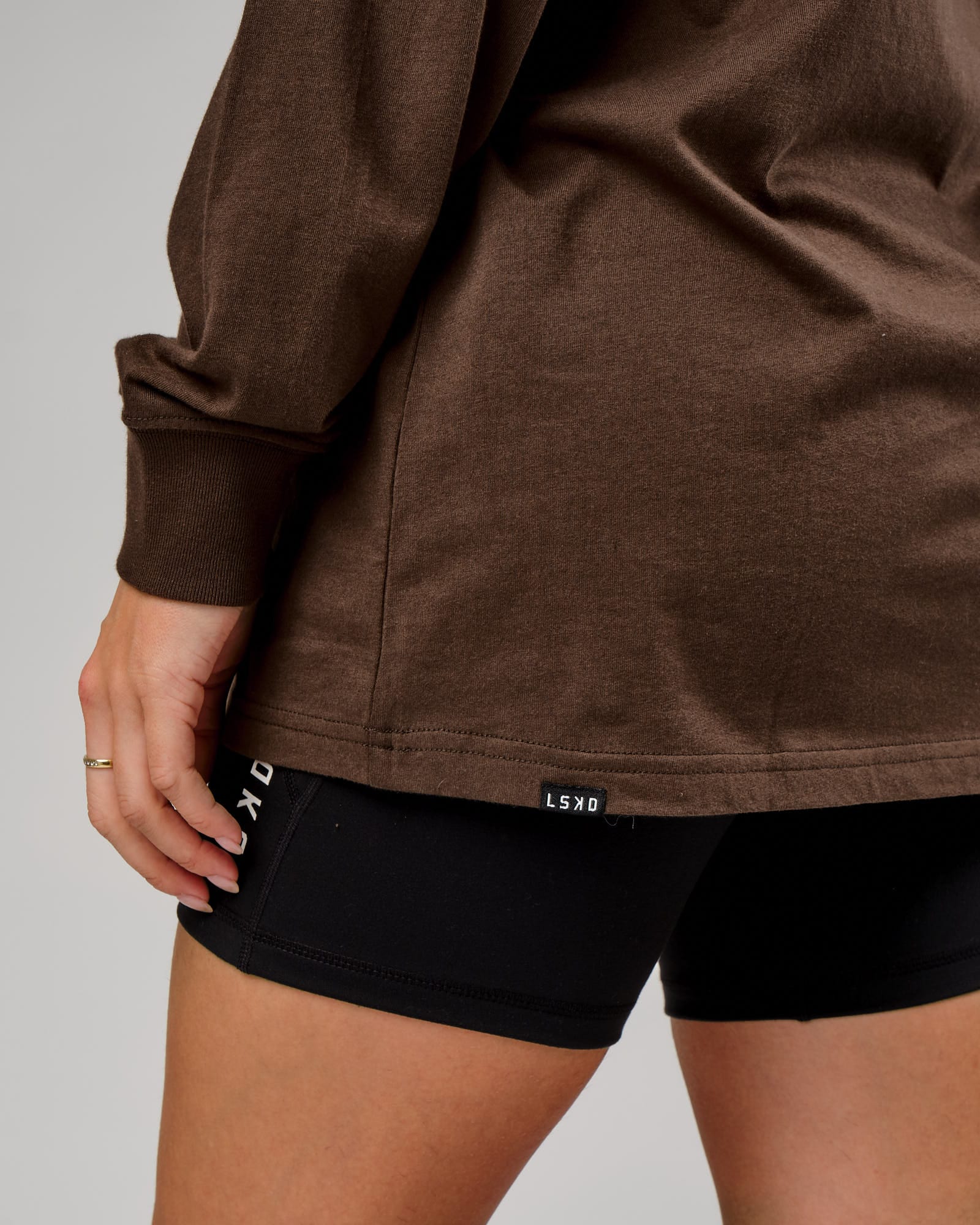 Model wearing Unisex Ascent LS Tee Oversize - Walnut