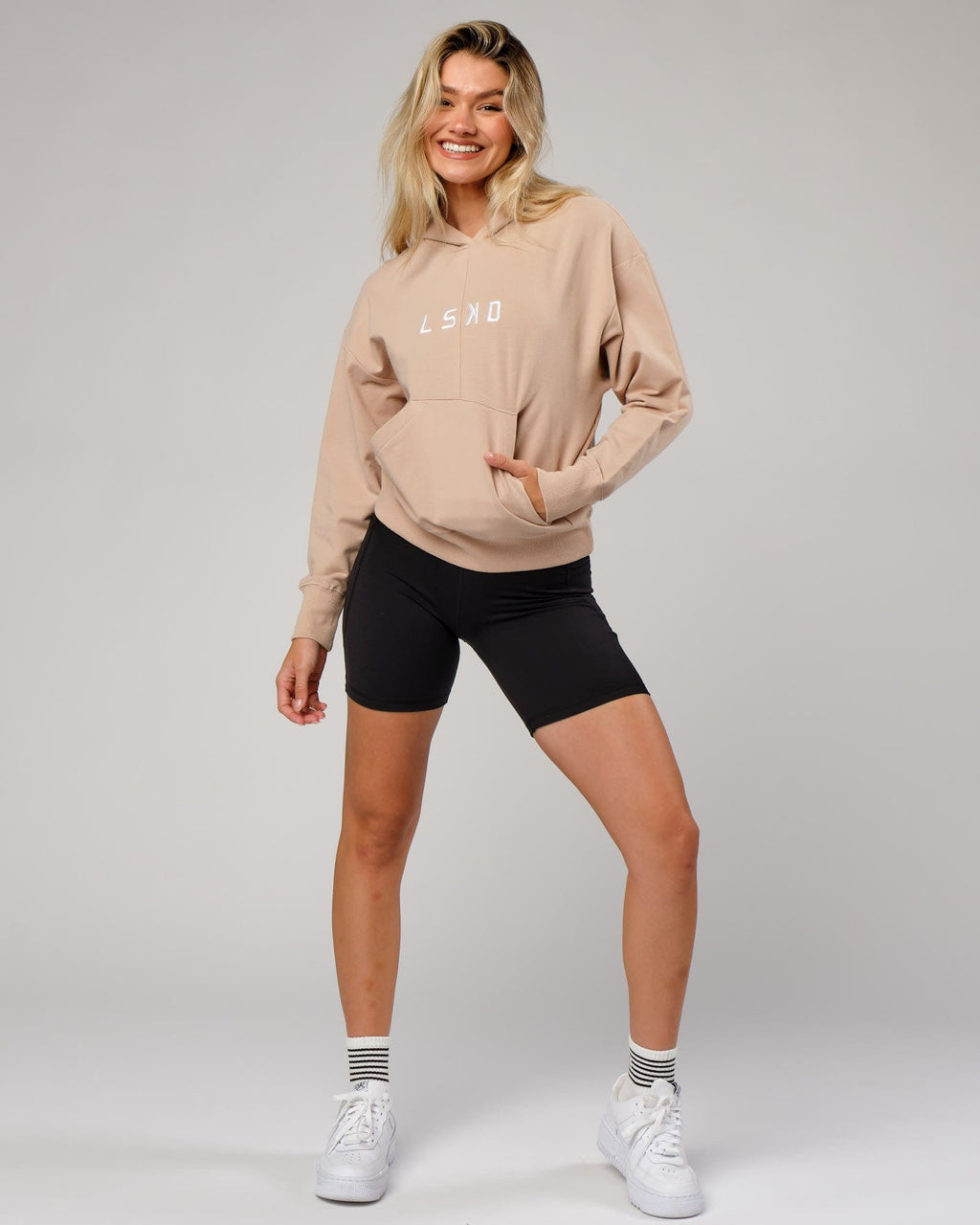 Model wearing Divide Hoodie - Nude