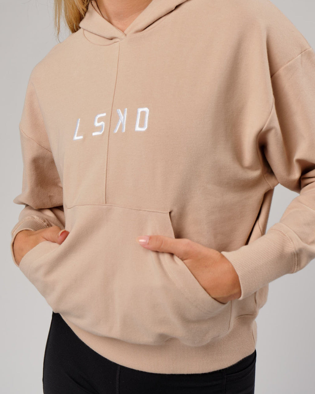 Model wearing Divide Hoodie - Nude