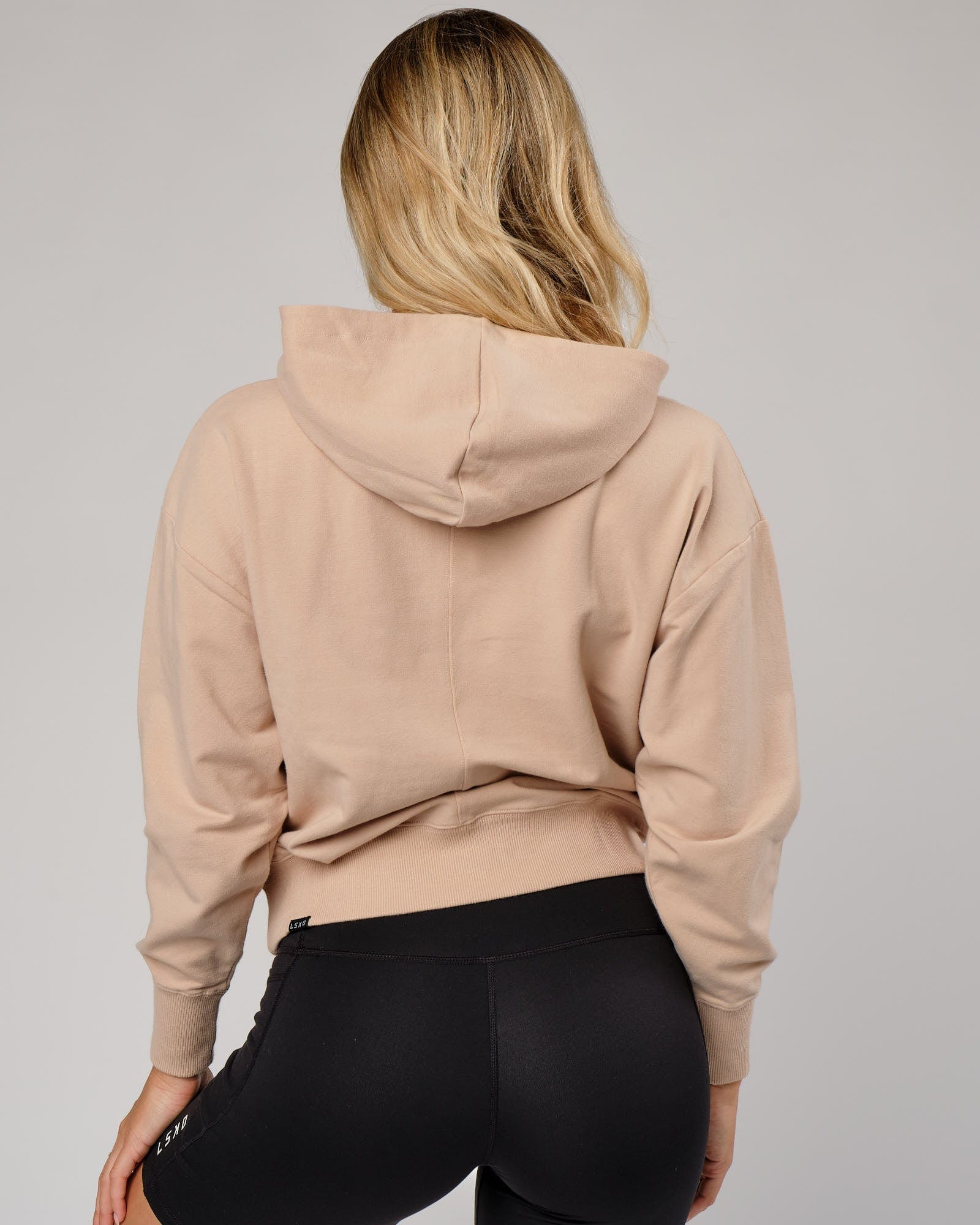 Model wearing Divide Hoodie - Nude